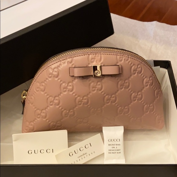Gucci Handbags - Authentic Gucci Signature Pouch